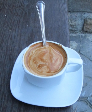 A picture of a delicious looking cup of coffee.